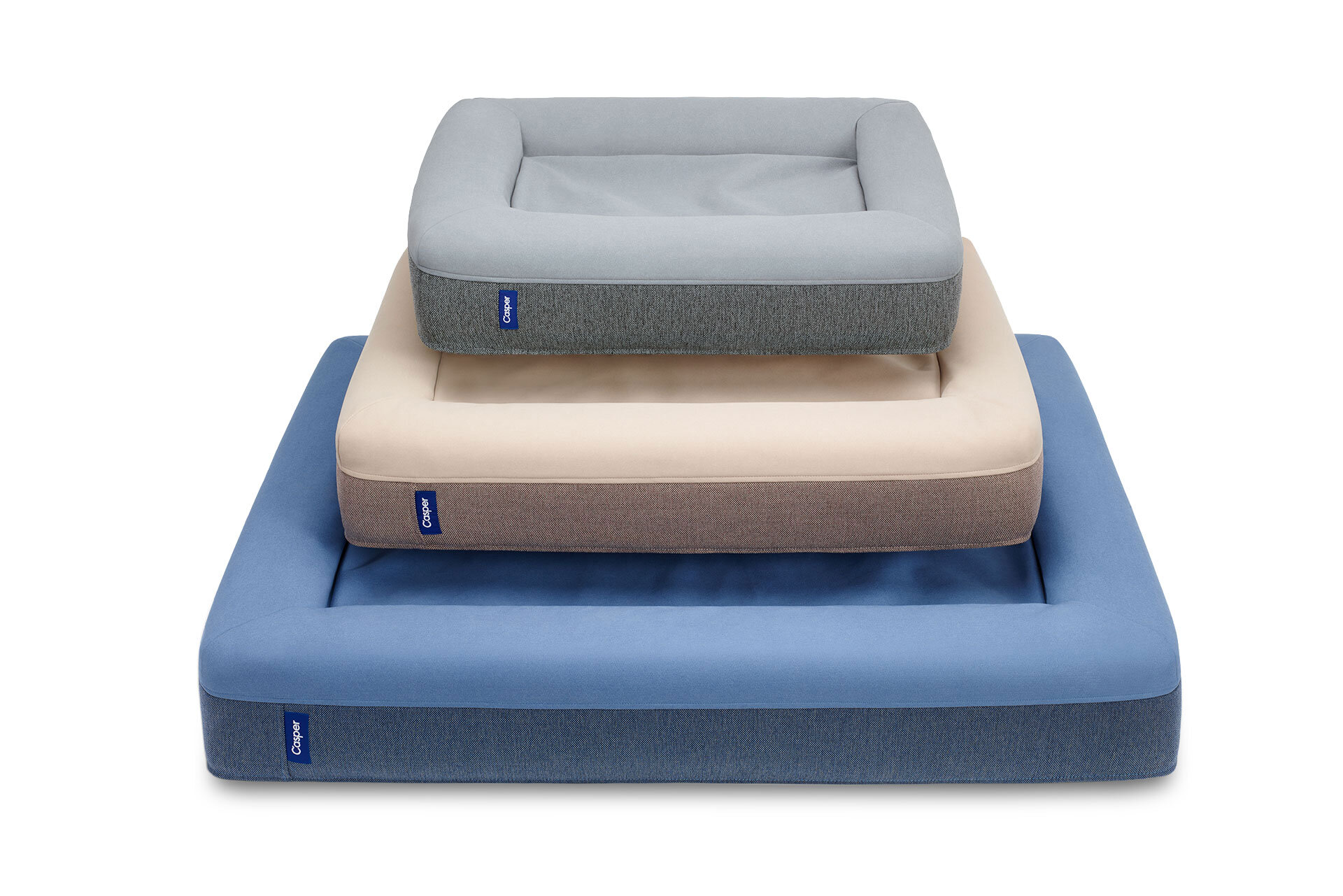 Stack of three dog beds